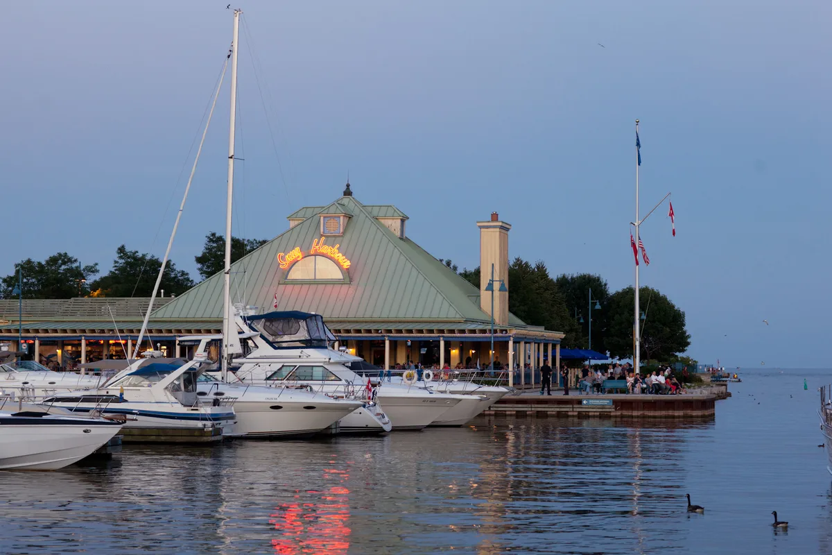Boats moored at Snug Harbour marina on the Port Credit waterfront, Lake Ontario, in Mississauga